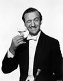 David Niven holding a martini glass and winking reference.jpg
